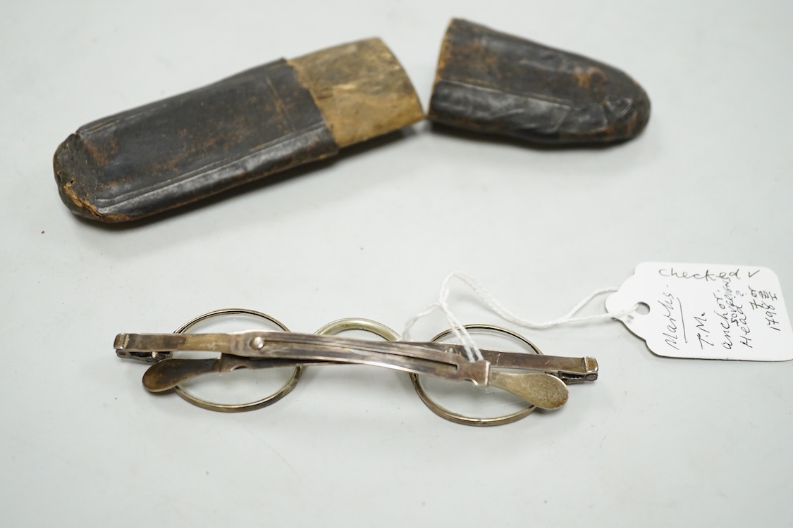 A pair of Wellsworth safety goggles with mesh sides, a pair of green tinted safety goggles with mesh sides, cased, and a pair of mesh wire sided safety spectacles with green tinted lenses (3)